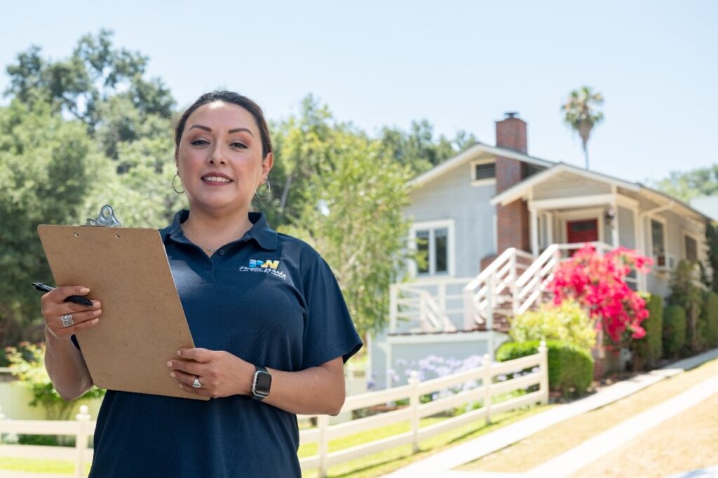 a  Public Works worker taking water survey