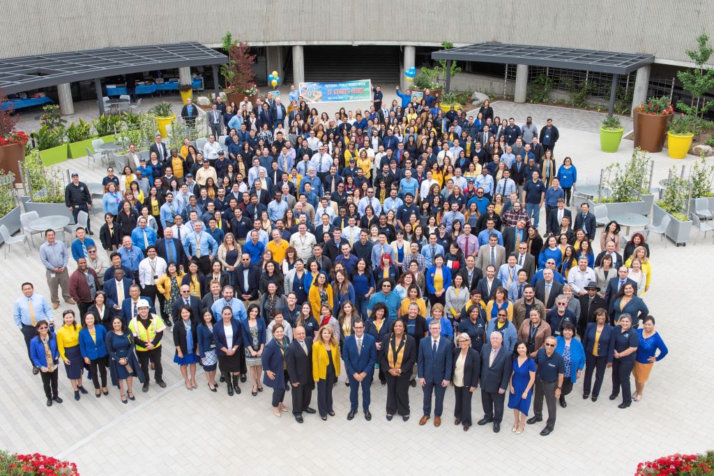 Aerial shot of employees in courtyard